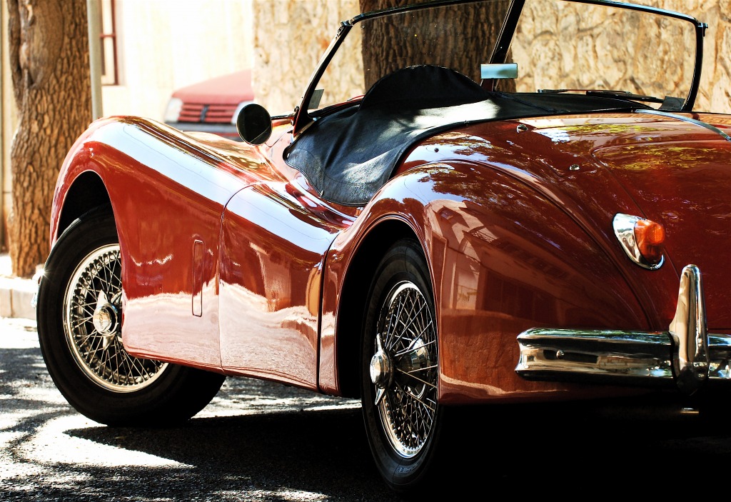 Red Jaguar XK140 jigsaw puzzle in Cars & Bikes puzzles on TheJigsawPuzzles.com