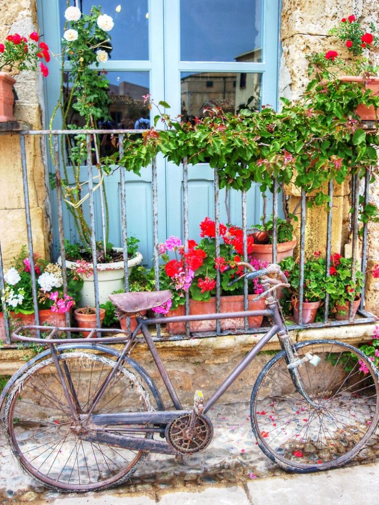 Frames, Wheels and Flowers - Sicily, Italy jigsaw puzzle in Flowers puzzles on TheJigsawPuzzles.com