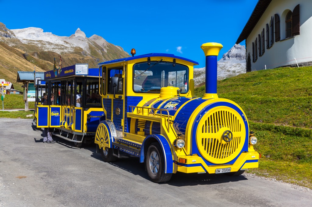 Sightseeing Train in Engelberg, Switzerland jigsaw puzzle in Cars & Bikes puzzles on TheJigsawPuzzles.com