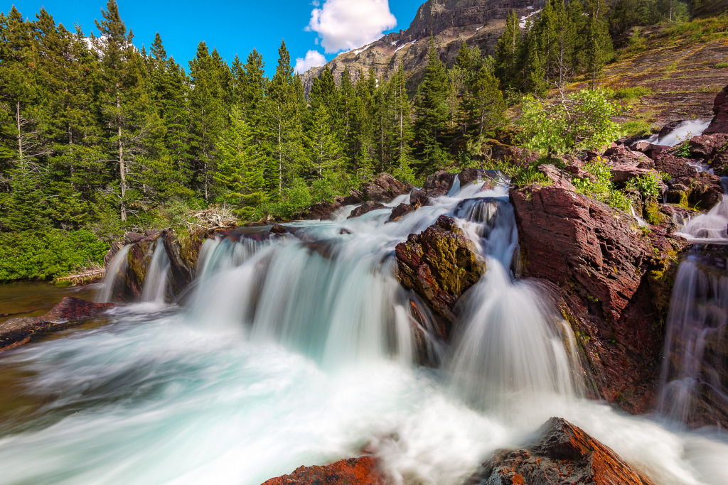 Redrock Falls at Many Glacier, Glacier National Park jigsaw puzzle in Waterfalls puzzles on TheJigsawPuzzles.com