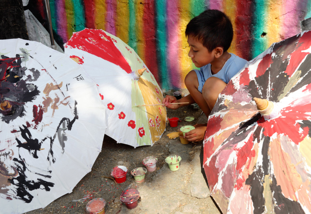 Traditional Umbrella Craftsmen, Java, Indonesia jigsaw puzzle in Puzzle of the Day puzzles on TheJigsawPuzzles.com