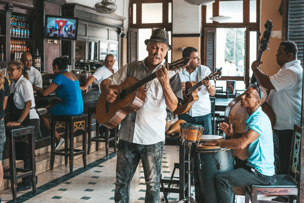 Cuban Band Performing in Bar Dos Hermanos jigsaw puzzle in People puzzles on TheJigsawPuzzles.com