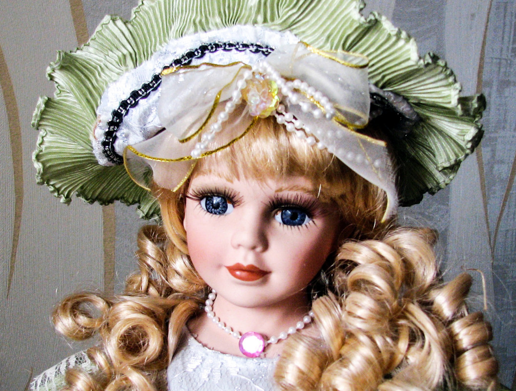 Porcelain Doll in a Beautiful Hat jigsaw puzzle in Puzzle of the Day puzzles on TheJigsawPuzzles.com